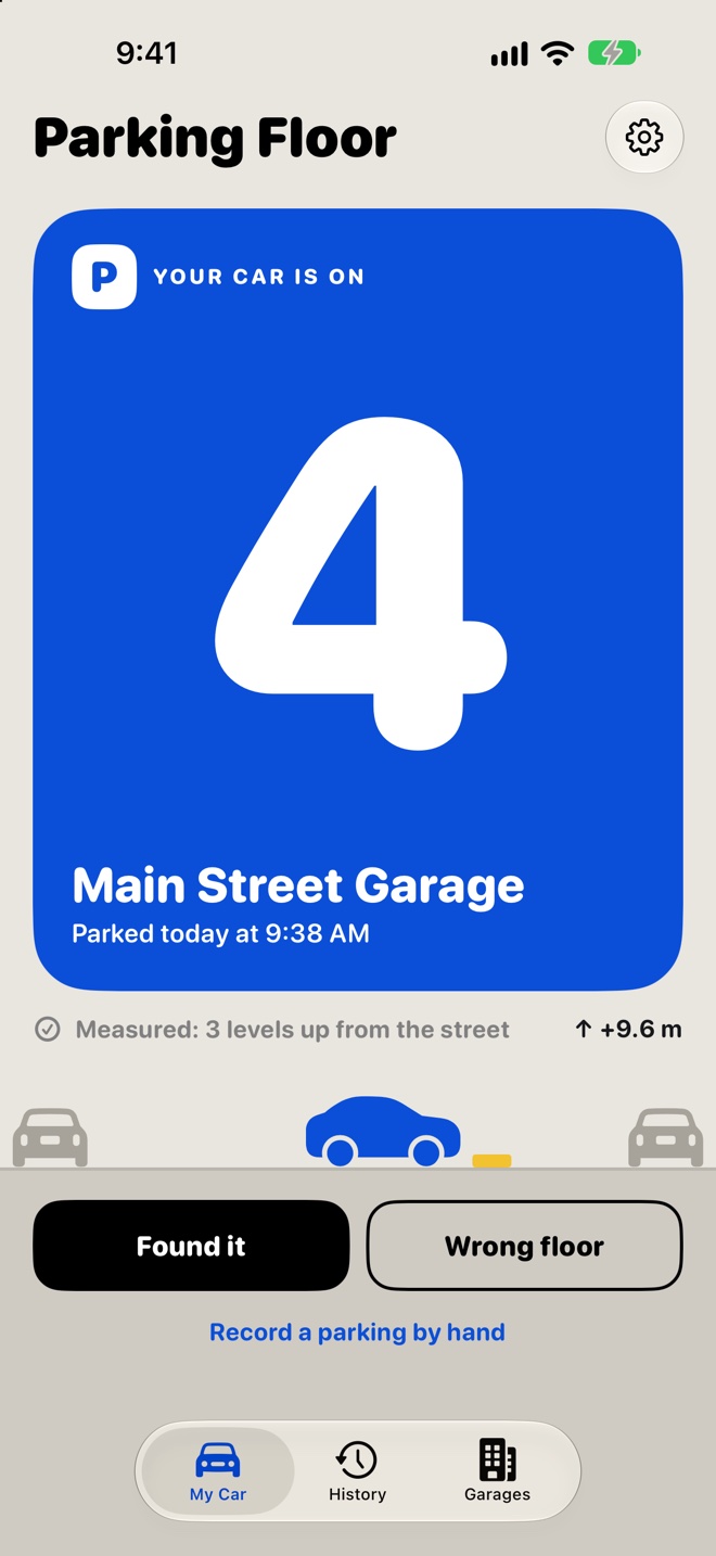 The app showing a parked car: your car is on floor 4 at Main Street Garage, parked today at 9:38 AM, measured 3 levels up from the street, 9.6 metres, with your blue car parked on the deck and Found it and Wrong floor buttons.